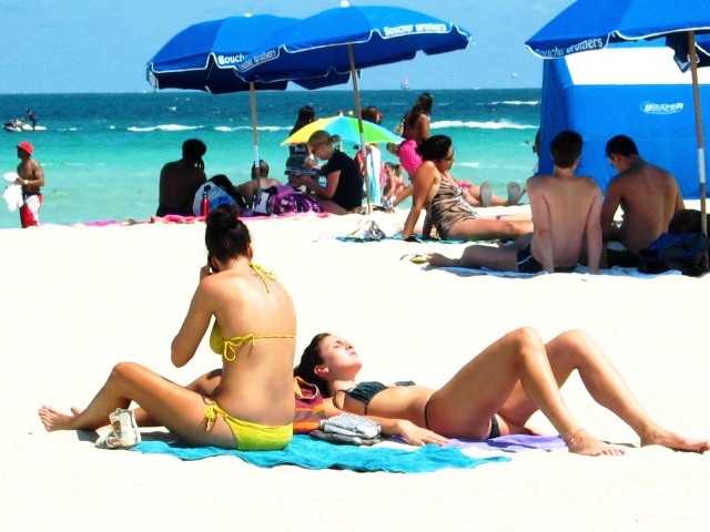 Two Beautiful Beach Girls Getting Tanned on the Beach #2 - Copyright © 2012 JiMmY RocKeR PhoToGRaPhY